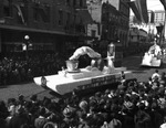 The Eight O'clock Coffee Float in a Parade