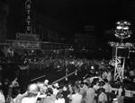 A Crowd and a marching band during a gala premiere at the State Theater