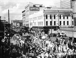 The Gasparilla Parade going down Franklin Street by Robertson and Fresh (Firm) and University of South Florida -- Tampa Campus Library