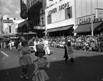 The Gasparilla Parade Marches Past Tampa Theater on Franklin Street by Robertson and Fresh (Firm)