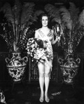 Miss Florida with her trophy and flowers by Robertson and Fresh