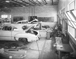 Men at Work at Elkes Pontiac's Paint and Body Division