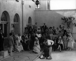 People dressed in Spanish attire and dancing at the Verbena del Tabaco Festival by Robertson and Fresh