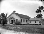 Protestant Church with Wood Siding by Robertson and Fresh