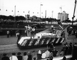 Spicola Hardware Company Float in Front of the Florida State Fair Grounds During the Gasparilla Parade