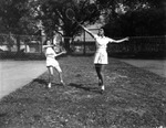 Two Young Ladies Playing Badminton at the University of Tampa by Robertson and Fresh (Firm)