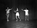 Three Women Playing Basketball by Robertson and Fresh