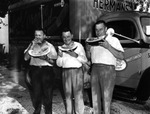 Three Men Eating Watermelon in Front of the Herman's Southern Prize Luncheon Meats Truck by Robertson and Fresh (Firm)