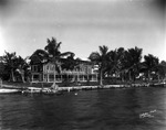 [A beautiful house on the water surrounded by palm trees] by Robertson and Fresh