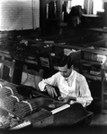 A Cigar Maker at Gradiaz Annis and Company
