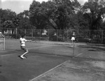 Young Women Playing Tennis at the University of Tampa