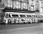 A Group Posing by a Chartered Bus in Front of the Floridian Hotel by Robertson and Fresh