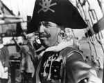 [A pirate aboard the Jose Gaspar during Gasparilla] by Robertson and Fresh