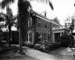[A two story brick house with colonial pillars] by Robertson and Fresh