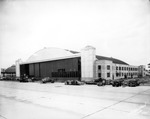 Construction Workers Around an Aircraft Hangar Undergoing Construction at MacDill Air Force Base