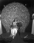 [A winning pageant contestant with flowers and tiara] by Robertson and Fresh