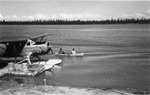 Docked Seaplane and Canoe by Robert Porter Allen