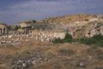General view over the Tetrastoon (four stoas) toward the Theater Baths, the Theater and the Acropolis. View SW