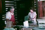 Two People Cooking in Shangri-La Cabin by University of South Florida