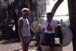 Two Men Stand by Grill at Shangri-La Retreat by University of South Florida