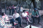Group Sits Outdoors in Lawn Chairs at Shangri-La by University of South Florida