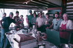 Group Poses in Kitchen of Shangri-La Cabin by University of South Florida