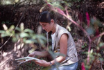 Woman Consults Map at Shangri-La Retreat by University of South Florida