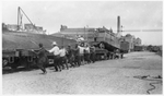 Unloading Railroad Cars, D by Unknown
