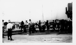 Unloading Railroad Cars, A by Unknown