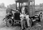 Two Men with Paul Dell Truck by Unknown