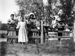 African American family by a fence
