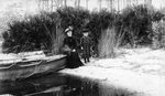 Woman and girl on shore of Lake Minneola