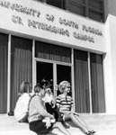 Students in front of Building A on the USF St. Petersburg campus, c.1970 by University of South Florida