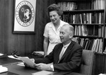 John Allen and secretary review registration forms by University of South Florida