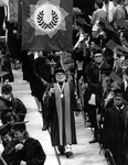 William Scheuerle with university mace during commencement by University of South Florida