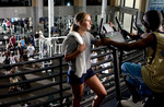 People using exercise equipment at Campus Recreation Center by University of South Florida