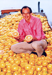 Prof. Richard Mansell amid grapefruit by University of South Florida