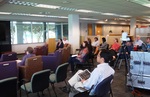 Audience at Faculty Research Lightning Talks, April 23, 2015, B by University of South Florida St. Petersburg. Nelson Poynter Memorial Library
