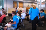 Audience at Faculty Research Lightning Talks, April 23, 2015, F by University of South Florida St. Petersburg. Nelson Poynter Memorial Library