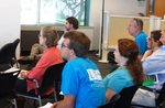 Audience at Faculty Research Lightning Talks, April 23, 2015, J by University of South Florida St. Petersburg. Nelson Poynter Memorial Library