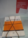 Exhibit Photos, Open Access @ the Poynter Library, October-November 2011, M by James Anthony Schnur and Kelsey Adams