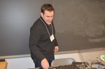 Andrew Babson Checks Sound Equipment, Goodbye to All That!, February 2013, A by Charles Vanover