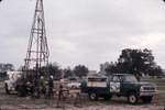 A drill rig set up NW of the Fine Arts Building next to a Florida Testing Laboratories, Inc. truck by University of South Florida