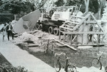 Construction near a side walk and Industrial Engineering Works truck; possibly newspaper photo by University of South Florida
