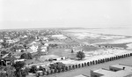 Aerial view: Bayboro Harbor area including houses, people, cars, pier by Francis G. Wagner and Nelson Poynter Memorial Library