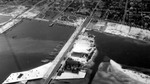 Aerial view: Bayboro Harbor; Boats lined up in slips; development one block off waterfront by Francis G. Wagner and Nelson Poynter Memorial Library