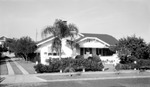 House with striped awnings at 871 17th Avenue North, including driveway to west by Francis G. Wagner and Nelson Poynter Memorial Library