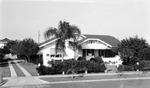 House with striped awnings at 871 17th Avenue North, including driveway to west by Francis G. Wagner and Nelson Poynter Memorial Library