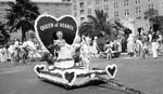 Queen of Hearts parade float at Vinoy Hotel, with people in costume and on bicycles, including children by Francis G. Wagner and Nelson Poynter Memorial Library