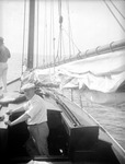 Men on sailboat by Francis G. Wagner and Nelson Poynter Memorial Library